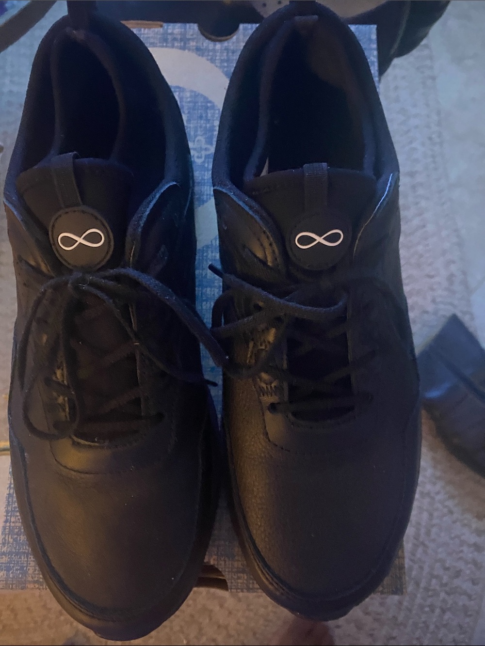 Women's Black Lace-Up Sneakers with Infinity Emblem